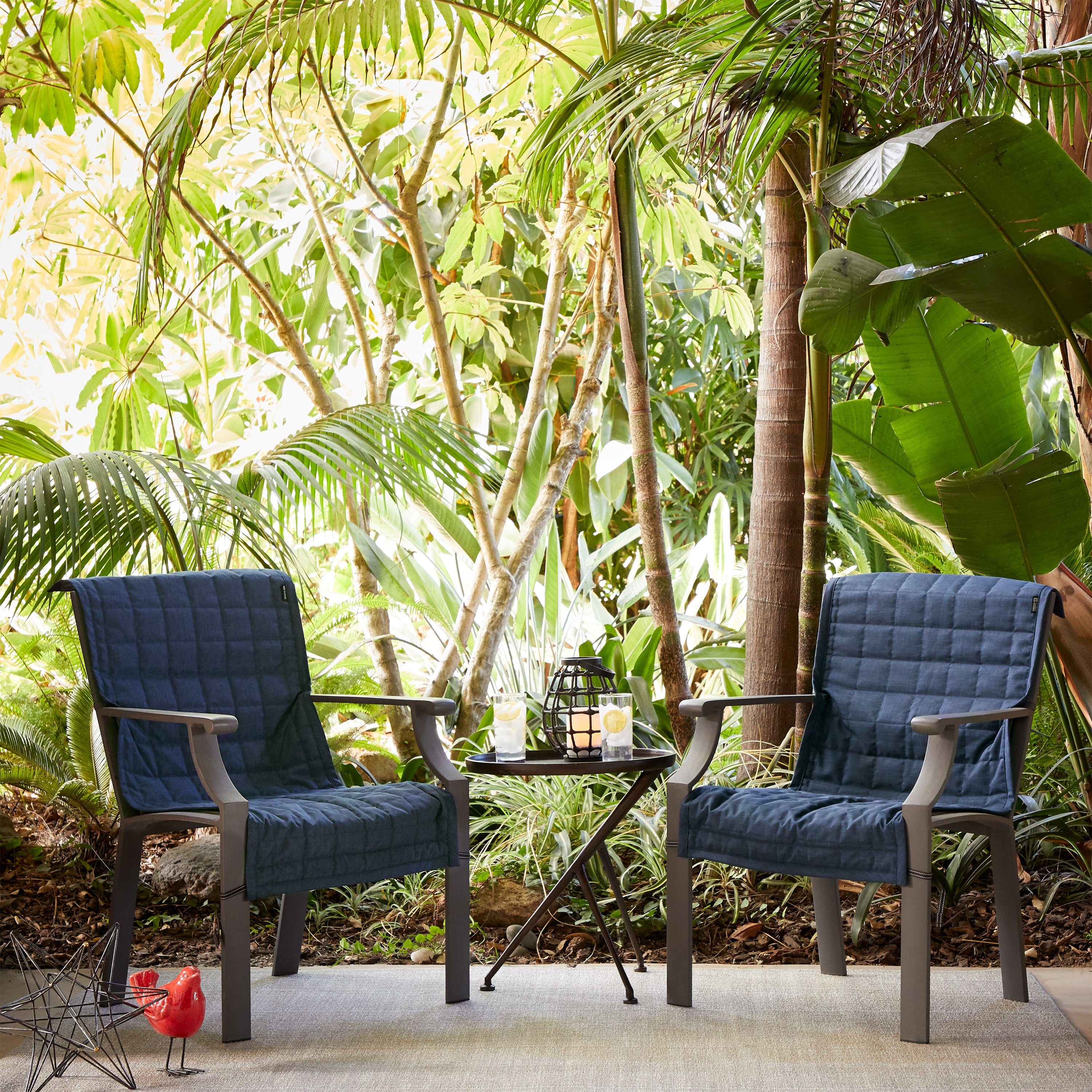 56-022_Patio_Montlake_FadeSafe_ChairSlipCover_LifestyleJurassic_HeatherIndigo_Detail.jpg