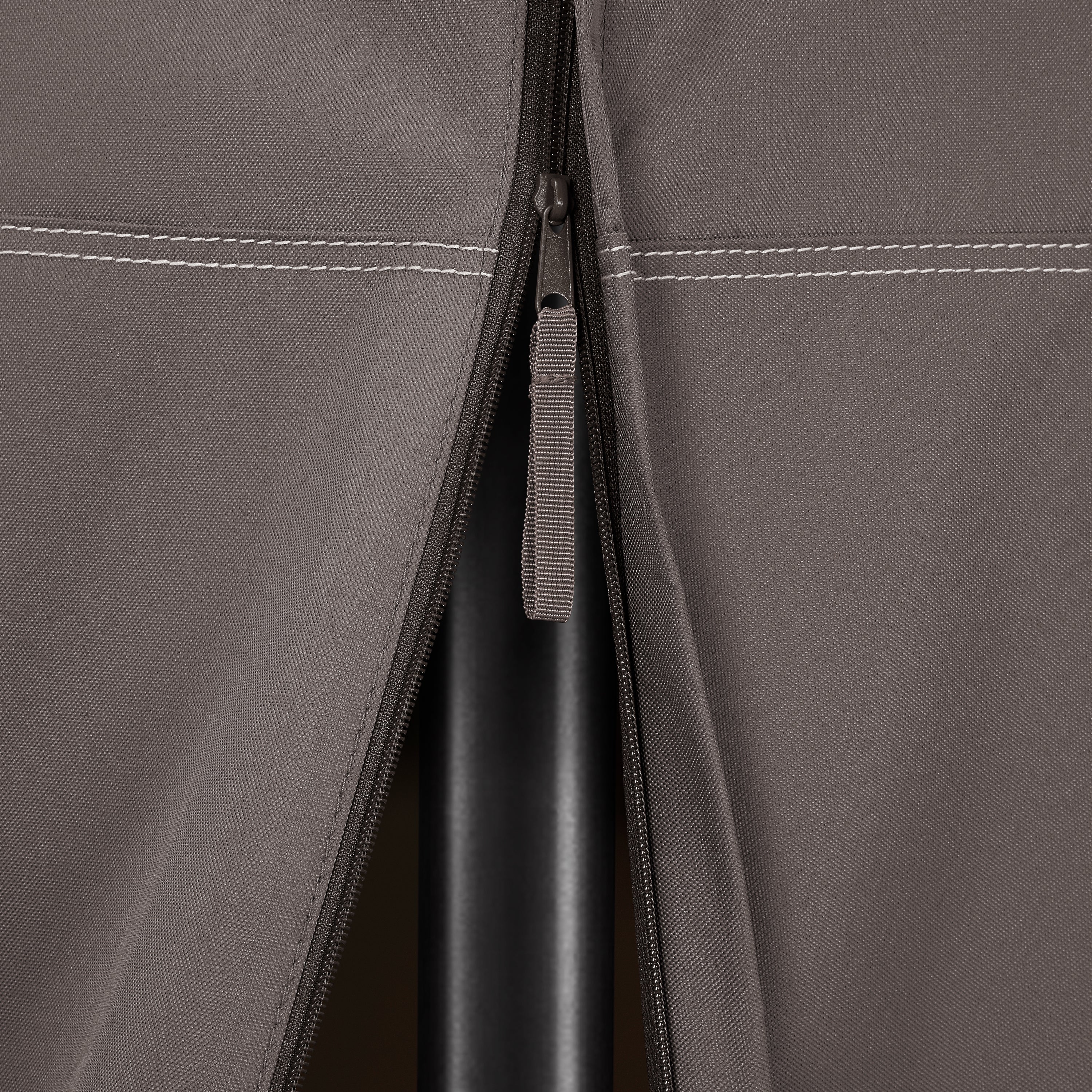 56-490_PATIO_Ravenna_StandUpPatioHeaterWTable_ZipperReveal_Detail.jpg
