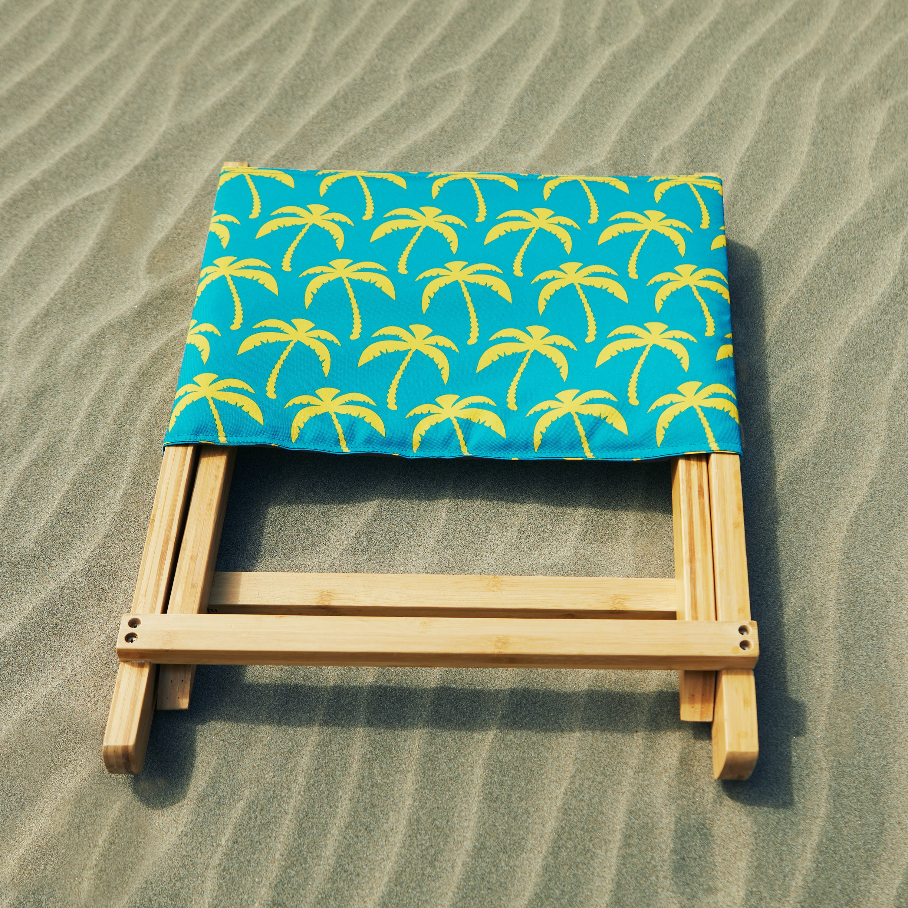 DRTCH_PATIO_DUCK_BeachChair_RealTeal_Palm_Lifestyle_Sand_Flatlay_Square.jpg