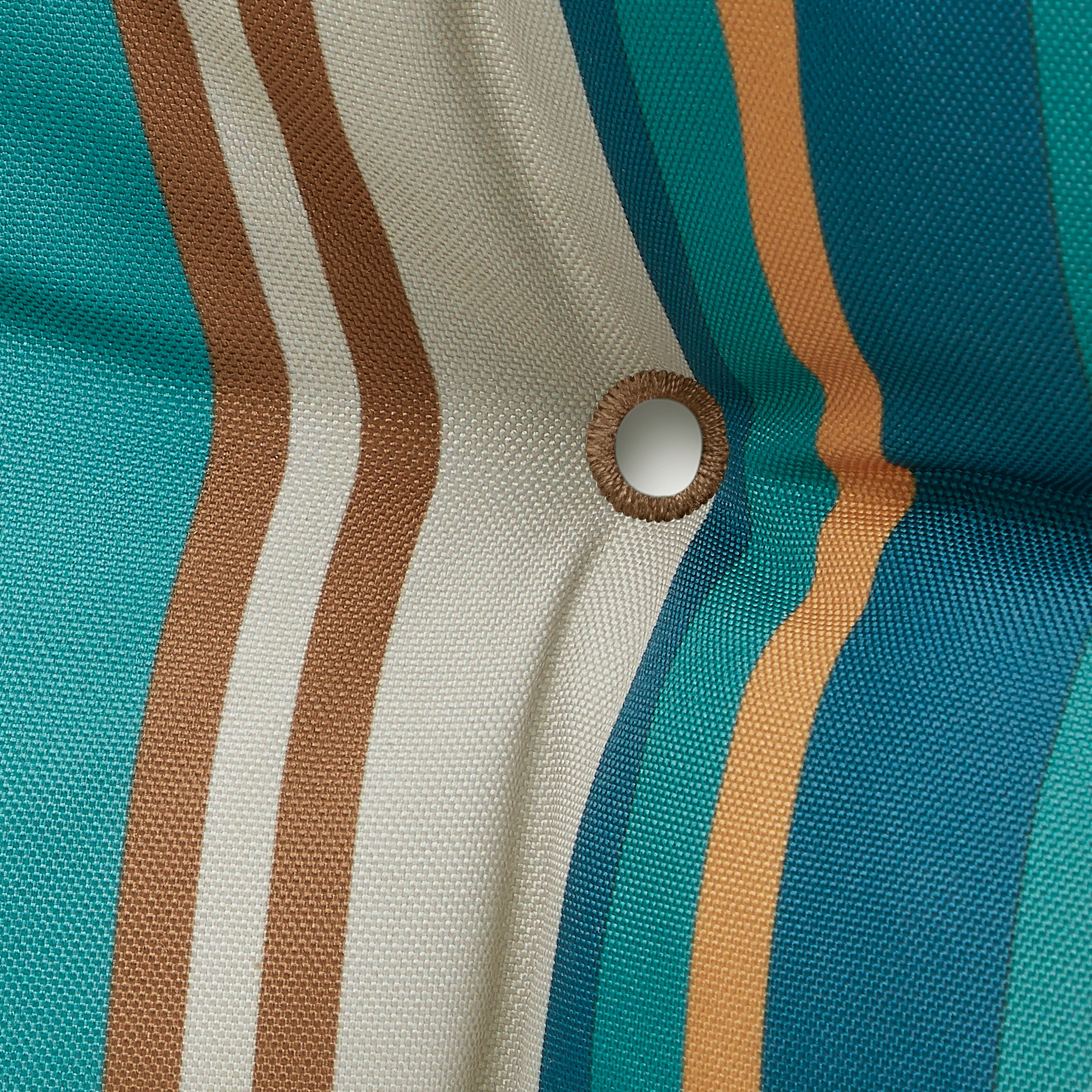 62-208_PATIO_OPP_BenchCushion_SantaFe_Stripe_Grommet_Detail.jpg