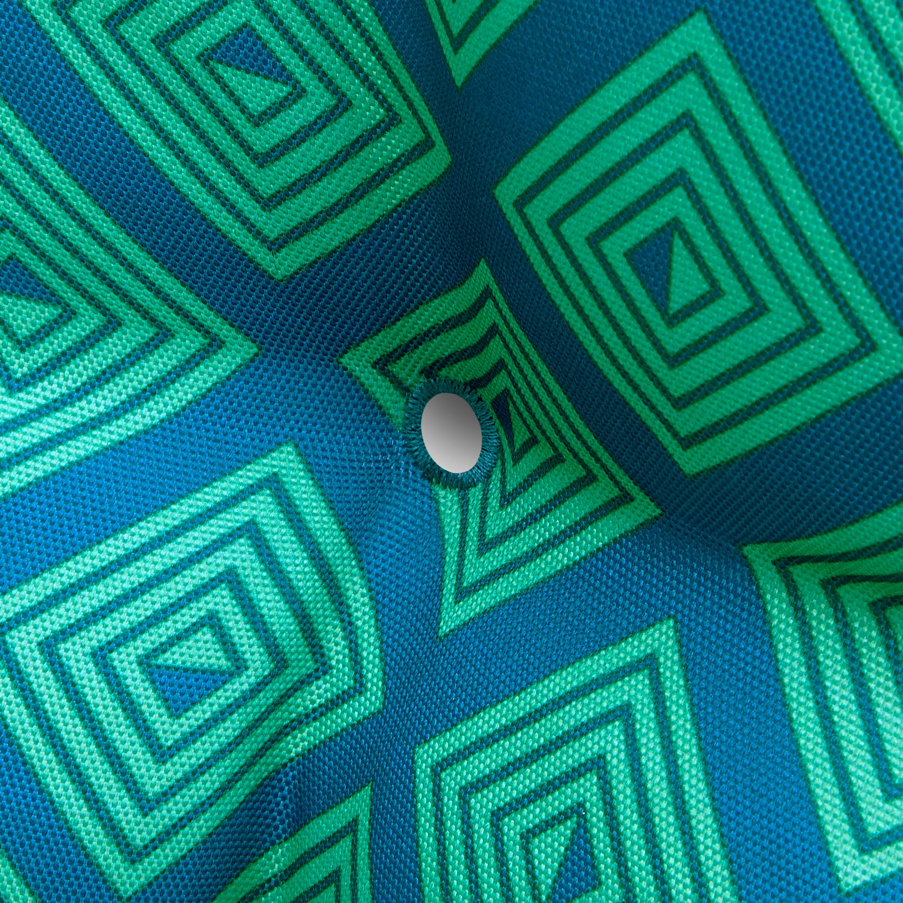DCTOCH_PATIO_DUCK_OPP_SeatCushions_Topaz_Mosaic_Grommet_Detail.jpg