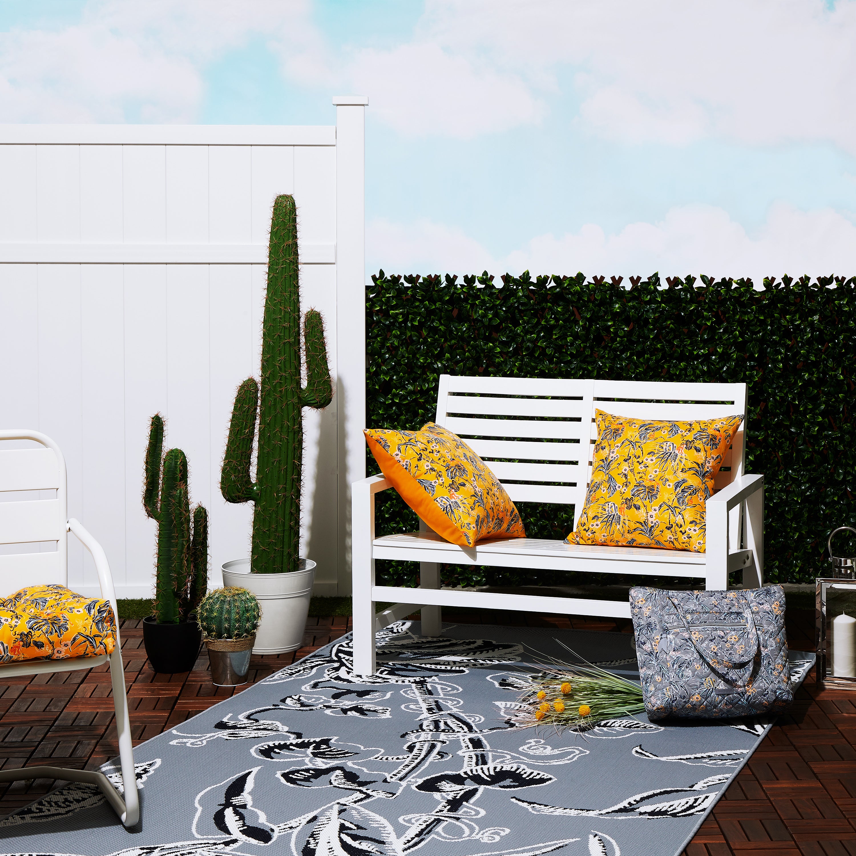 62-1XX_PATIO_VeraBradley_Rug_Grey_AccentPillows_Gold_SeatCushion_Gold_Lifestyle_Patio_Group.jpg