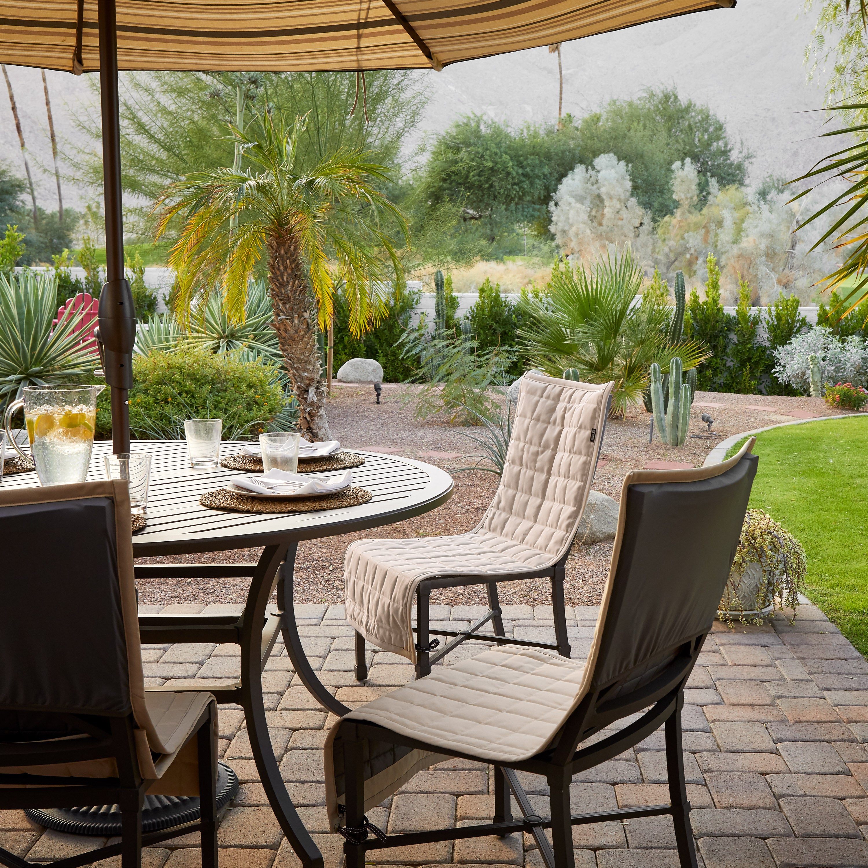 56-010_Patio_Montlake_FadeSafe_Slip_Cover_Chair_LifestyleTable_AntiqueBeige_Detail.jpg