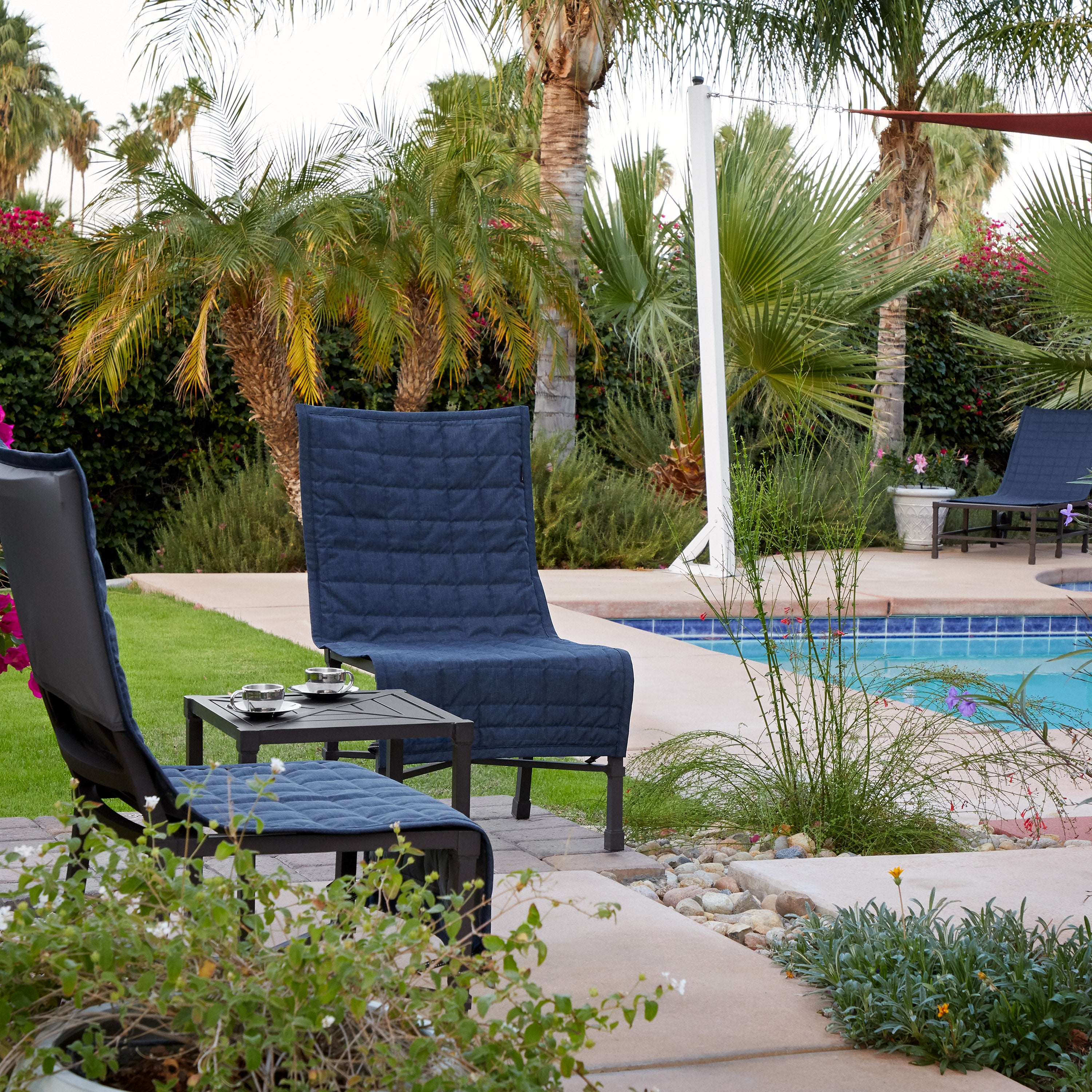 56-022_Patio_Montlake_FadeSafe_ChairSlipCover_LifestylePool_HeatherIndigo_Detail.jpg